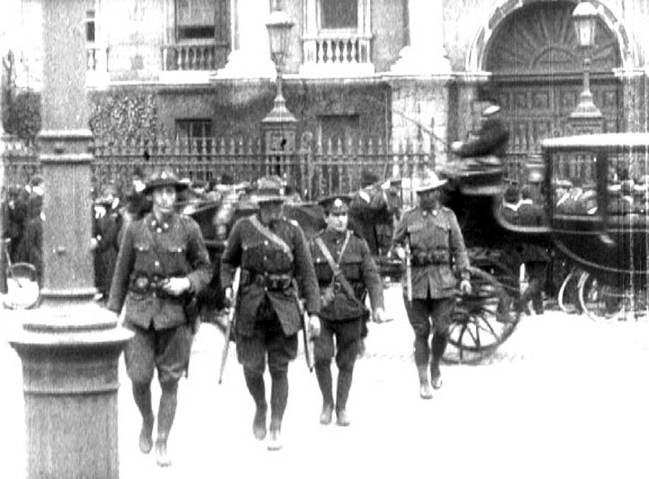 Anzacs outside Trinity College at the time of the Easter Rising in 1916.  Picture shows two New Zealanders, a British soldier and an Australian, believed to be Private Michael McHugh. 