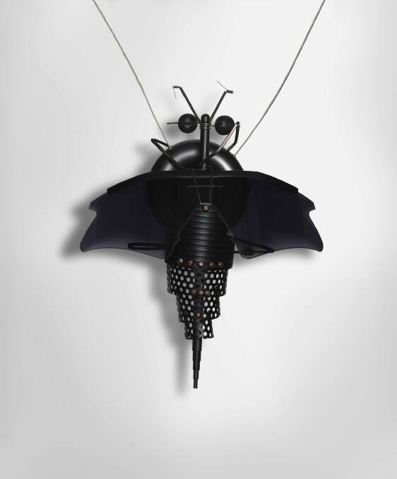 Susan Cohn
<i>Systematic Gibsonia no. 2</i>, condom pendant 1995 in Bodywork: Australian Jewellery 1972-2012 at Craft ACT 
anodised aluminium, Oakley black iridium sunglass lenses, Sony wind socks, 750 white gold, 925 silver, stainless steel, aluminium plate
National Gallery of Australia, Canberra
Purchased 1995 Photo: supplied