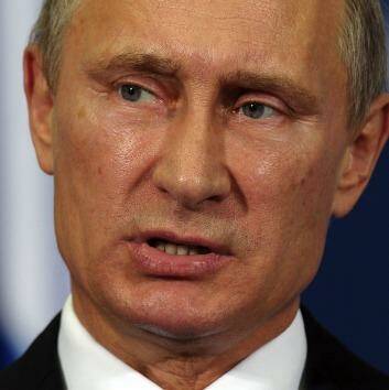 Looming confrontation: Russian President Vladimir Putin may or may not consent to be "shirt-fronted". Photo: Bloomberg