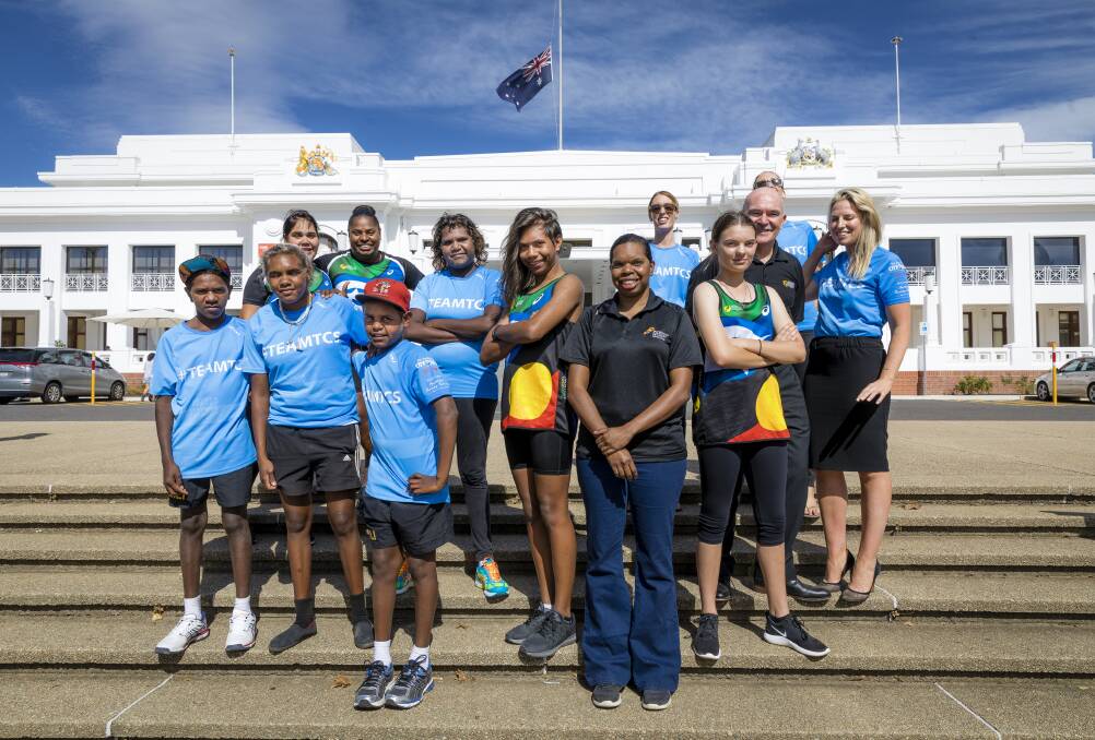 Runners from Kakadu in the Northern Territory, and Mimili and Indulkana in South Australia arrive in Canberra ahead of the Australian Running Festival. Photo: Sitthixay Ditthavong