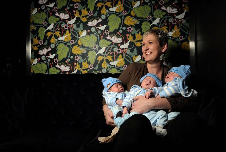 Karen Guthrie with her identical boy triplets (L to R) Kobi, Liam and Nash. Photo: Colleen Petch