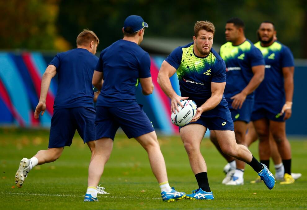 Practising his passing: Wallabies prop James Slipper. Photo: Getty Images