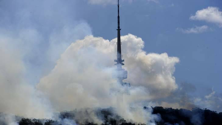 Smoke around the tower from a controlled burn on Black Mountain. Photo: Melissa Adams