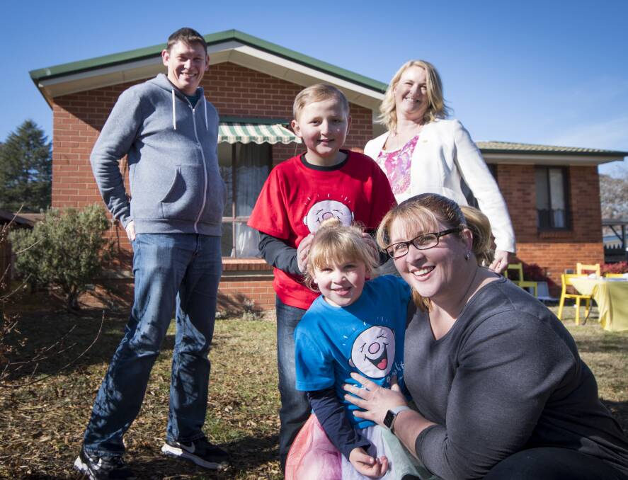 Bungendore family Stu and Bec Little with their two children Ryan and Zoe, alongside Camp Quality chief executive Kylea Tink. Photo: Elesa Kurtz