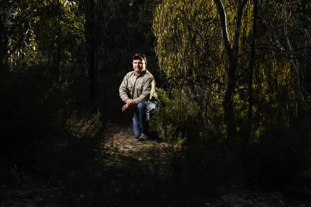 Canberra Off-Road Cyclists vice-president Darren Stewart is concerned about wire traps set up for cyclists and dirt bike riders at the Tuggeranong Nature Reserve. Photo: Dion Georgopoulos