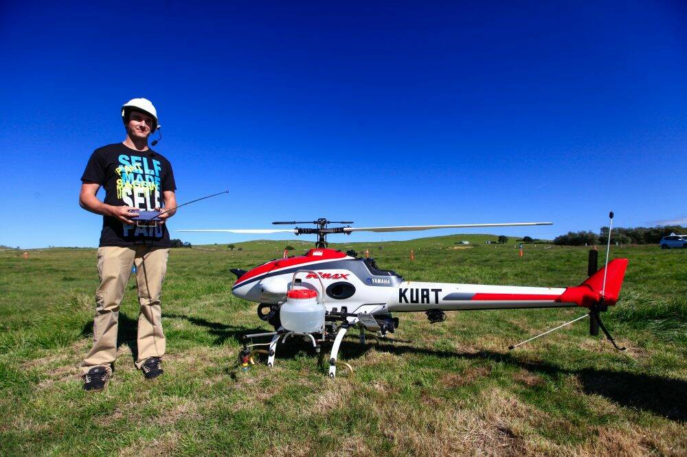 Lawson Bopping, 24, of Braidwood, takes control of a unmanned aerial vehicle under the guidance of a Yamaha aerial unit training team.  Photo: Katherine Griffiths