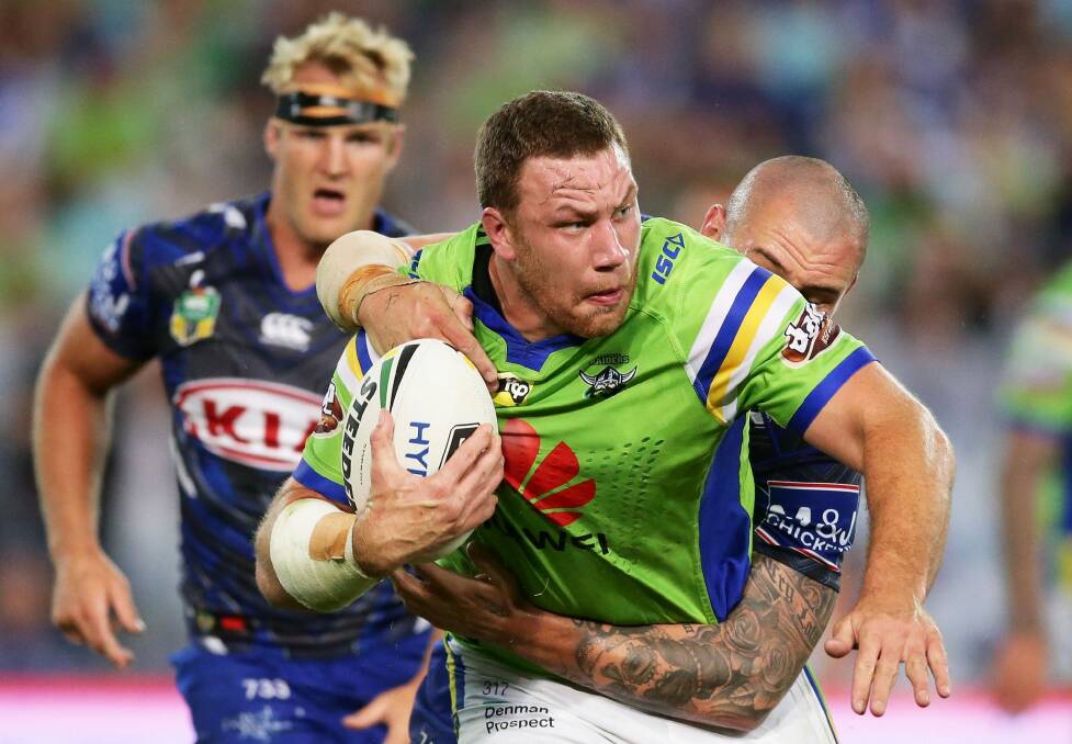 Tight battle: Shannon Boyd is wrapped up by David Klemmer. Photo: Getty Images
