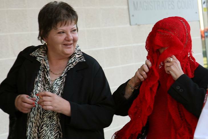 Brothel receptionists Diana Agnes Molnar, 58, (left) and Eva Maria Sara, 65, (right) leave ACT Magistrates Court. They were acquitted of charges relating to the employment of a teenage girl they employed the day before she died. Photo: Jeffrey Chan