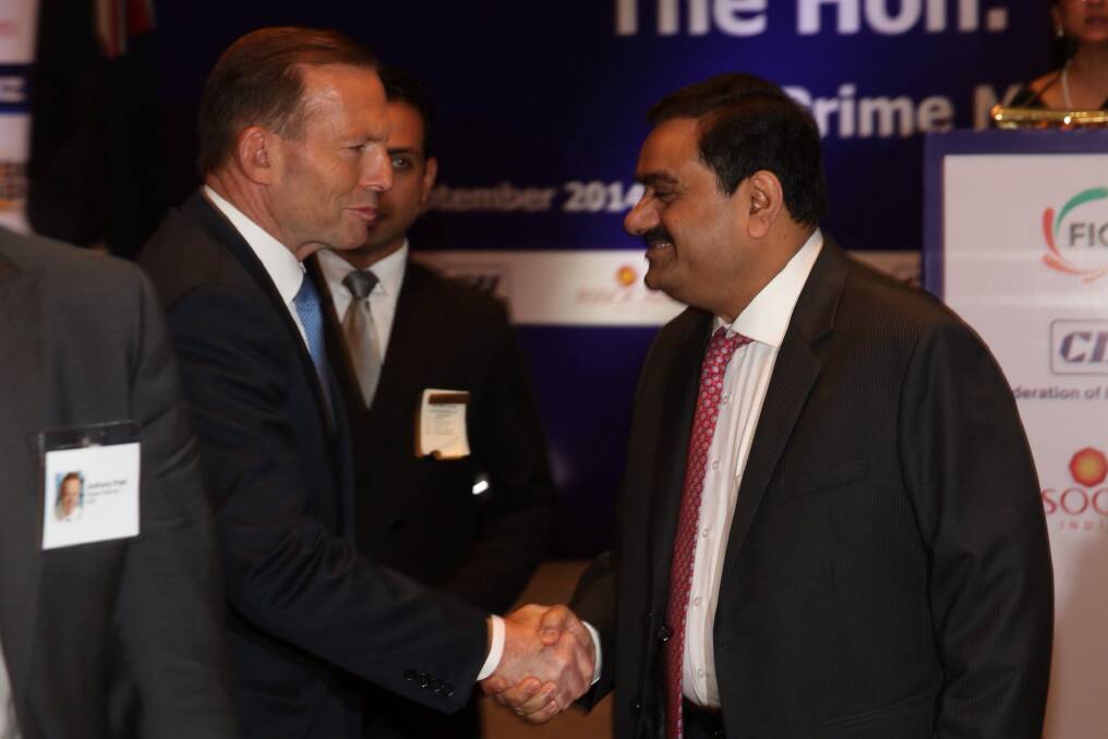 Former prime minister Tony Abbott with mining magnate Gautum Adani. Photo: Andrew Meares