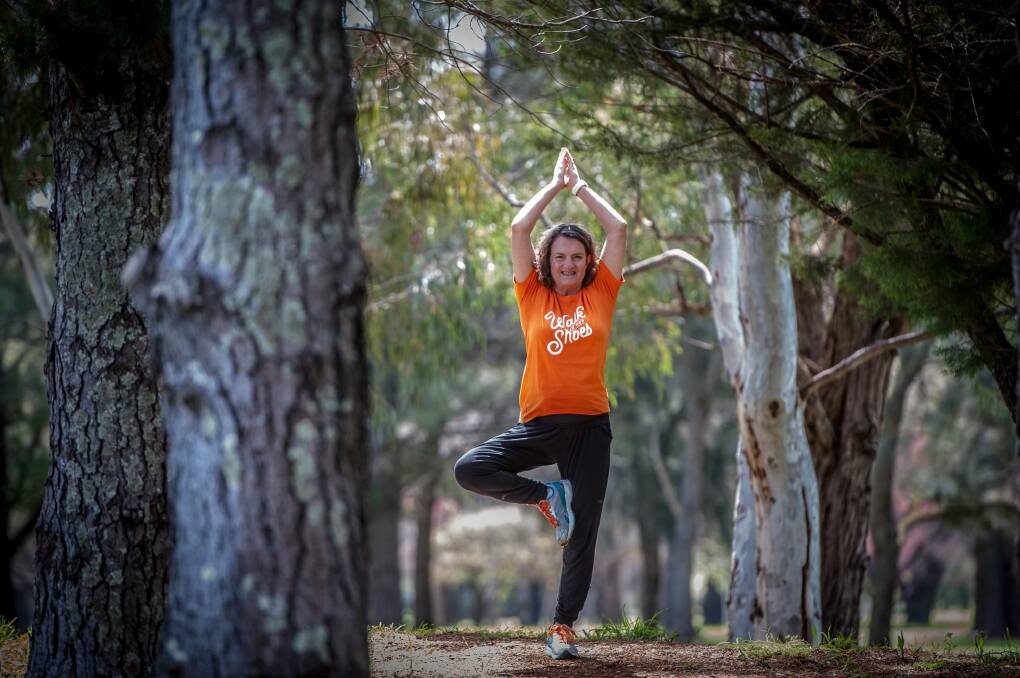 Lynnette Dickinson of Lyneham suffers from multiple sclerosis and up until recently was confined to a wheelchair- took up yoga and has become strong enough to walk on her own. She has signed up to the 'Walk in Her Shoes' marathon run/walk campaign. Photo: Karleen Minney