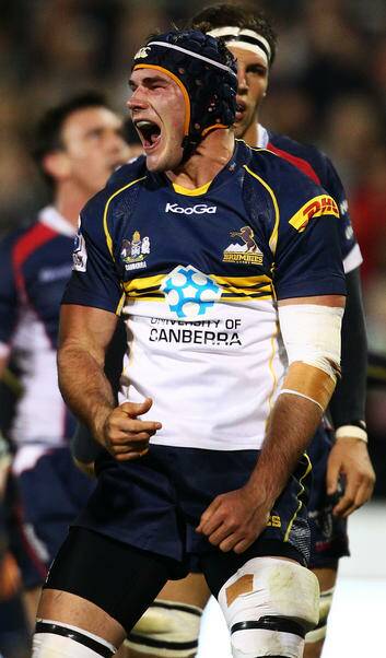 CANBERRA, AUSTRALIA - APRIL 14:  Ben Mowen of the Brumbies celebrates scoring a try during the round eight Super Rugby match between the Brumbies and the Rebels at Canberra Stadium on April 14, 2012 in Canberra, Australia.  (Photo by Mark Nolan/Getty Images) Photo: Mark Nolan