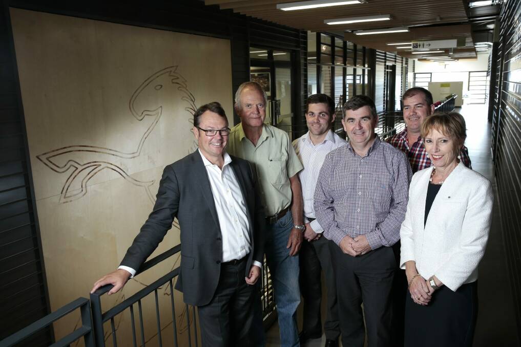 Robert Kennedy, left, has called for unity among the Brumbies board members. He is pictured with Geoff Larkham, Angus McKerchar, John Gillespie, Peter Callaughan and Carmel McGreggor. Photo: Jeffrey Chan