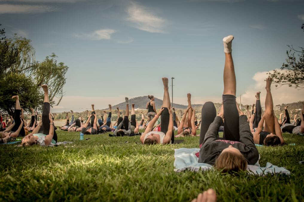 Join in some yoga by the lake before heading off for breakfast. Photo: Karleen Minney