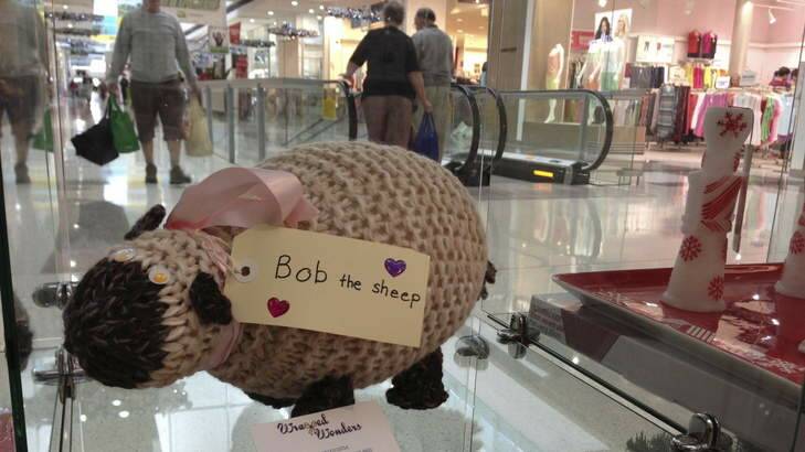One of Dr Frances Miley's knitted sheep on display at the Gungahlin shops. Photo: Supplied