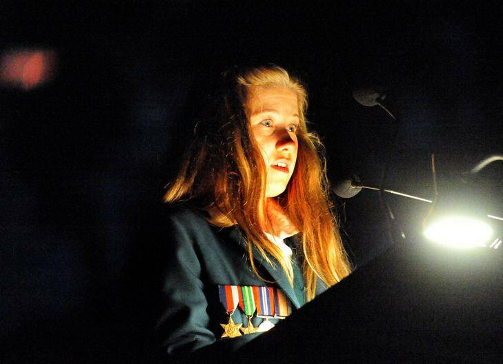 Jordie Pardoel reads In Flanders Fields at this morning's Dawn Service at the Australian War Memorial. Photo: Karleen  Minney