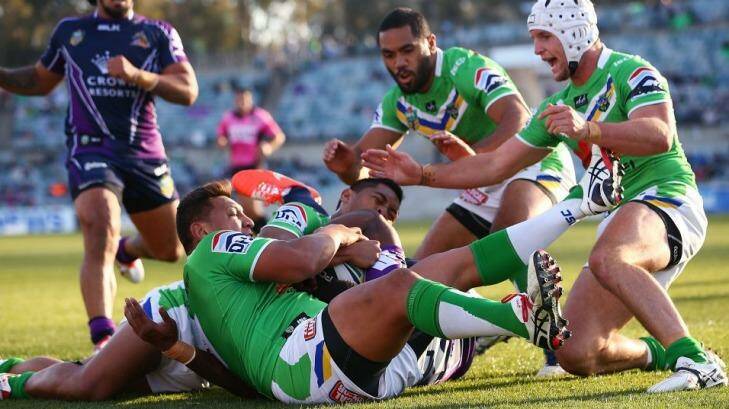 The NRL has ruled officials were correct in denying a try to Melbourne's Sisa Waqa against the Canberra Raiders on Sunday. Above, Waqa is denied again. Photo: Getty Images
