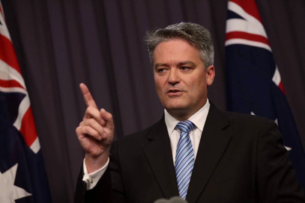 Finance minister Mathias Cormann has defended a "pause" to the National Capital Authority's funding increase. Photo: Andrew Meares