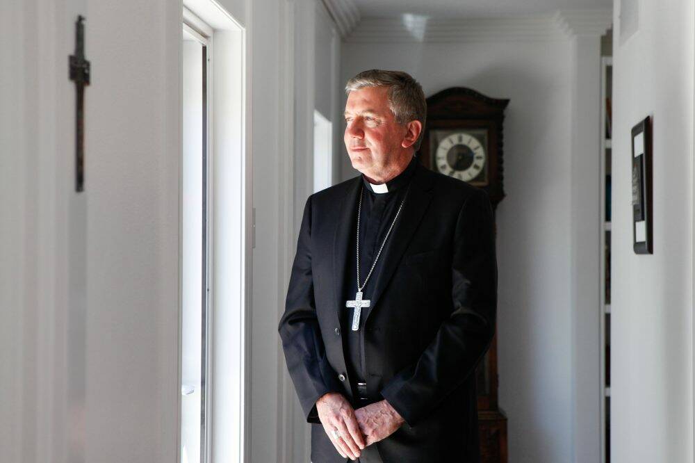 Catholic Archbishop of Canberra and Goulburn, Christopher Prowse announced an independent review into the decision to allow a priest, who had a history of complaints regarding improper conduct towards children, to live next to schools. Photo: Katherine Griffiths