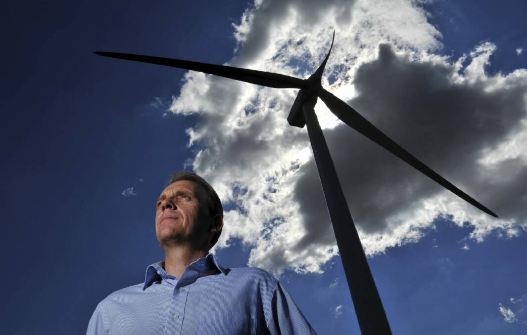 Environment Minister Simon Corbell at the Acciona wind farm at Gunning last year. Photo: Graham Tidy
