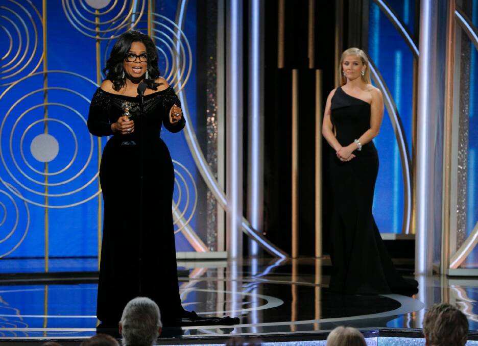 Reese Witherspoon presented Oprah with the Cecil B. DeMille Award at the Golden Globes earlier this year. Photo: PAUL DRINKWATER