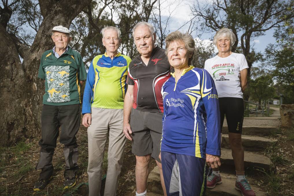 Canberra's population above the age of 65 is growing faster than most places. Jack Palmer, Eino Meuronen, Bob Mouatt, Ann Ingwersen, and Caroline Campbell before a walk up Mount Ainslie. Photo: Sitthixay Ditthavong