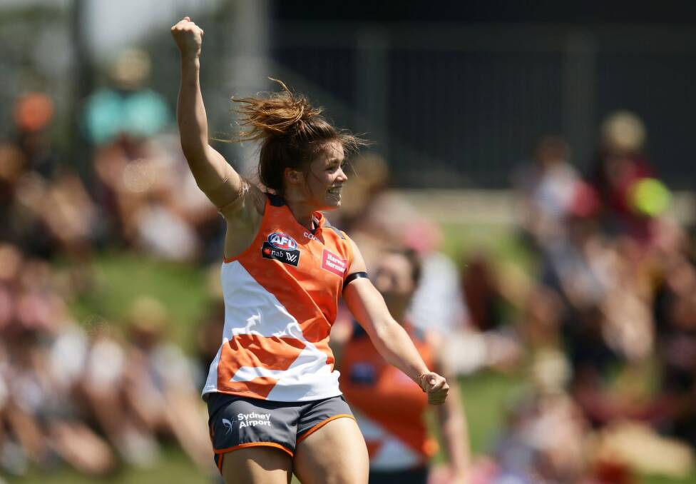 GWS player Stephanie Walker celebrates a goal during the AFLW round three match between the Giants and Fremantle Dockers in Blacktown on Saturday. Photo: Getty Images