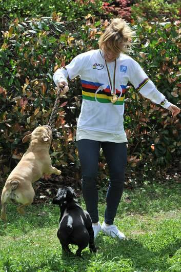 World Champion BMX rider, Caroline Buchanan, at her Kambah home with her two pet french bulldogs, Diesel and Brie. Photo: Graham Tidy