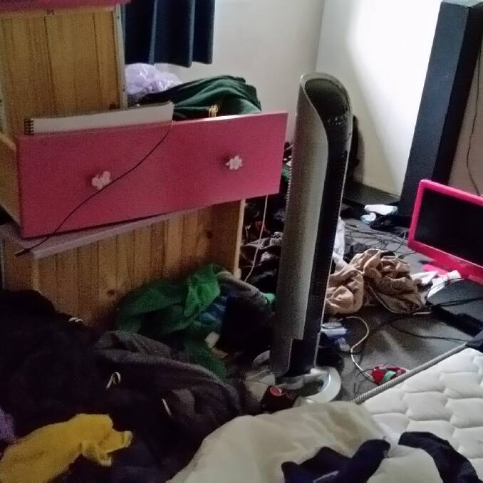 Photos from inside the property showed a mattress without sheets and clothes strewn across the floor. Photo: Supplied