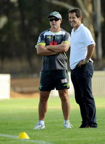 Canberra coach David Furner talks with Robbie Deans at Raiders training on Thursday. Photo: Colleen Petch