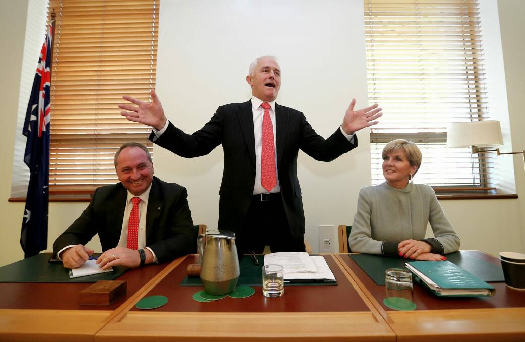 Prime Minister Malcolm Turnbull, with Deputy Prime Minister Barnaby Joyce and deputy Liberal leader Julie Bishop, addresses Coalition MPs on Monday. Photo: Alex Ellinghausen