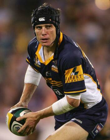 Former Brumby Stephen Larkham in action against the Cats at Canberra Stadium in 2006. Photo: Getty Images