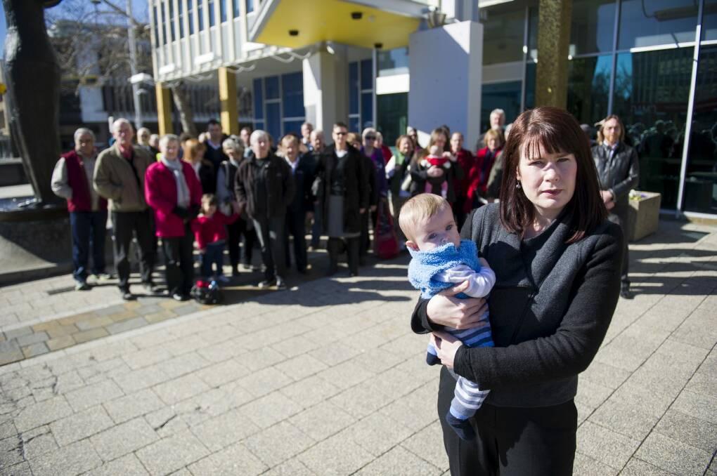 Brianna Heseltine with baby Marcus and supporters of Fluffy Owners and Residents Action Group. Photo: Rohan Thomson