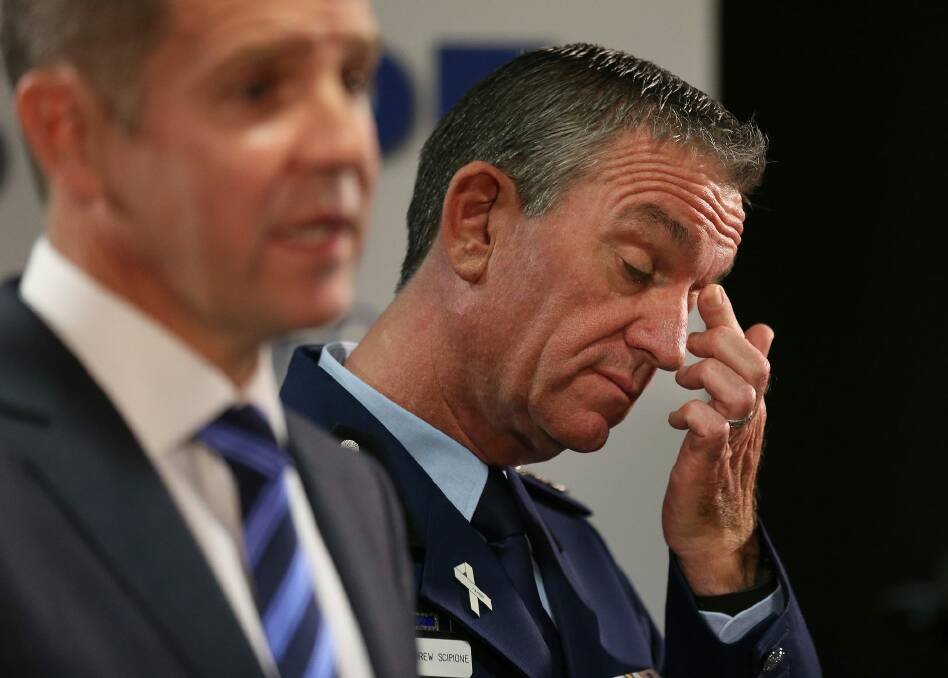 NSW Police Commissioner Andrew Scipione and Premier Mike Baird address the media after the shooting of a police worker in Parramatta. Photo: AAP