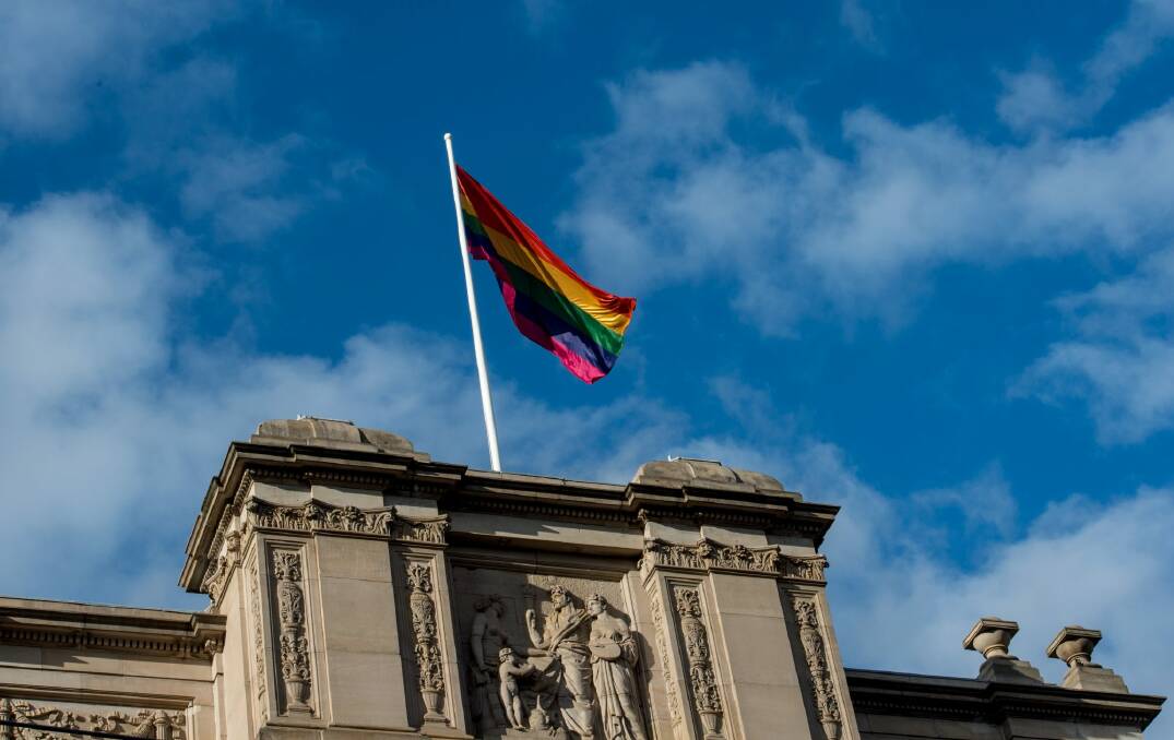 A rainbow flag atop Victorian Parliament House last year. Photo: Penny Stephens