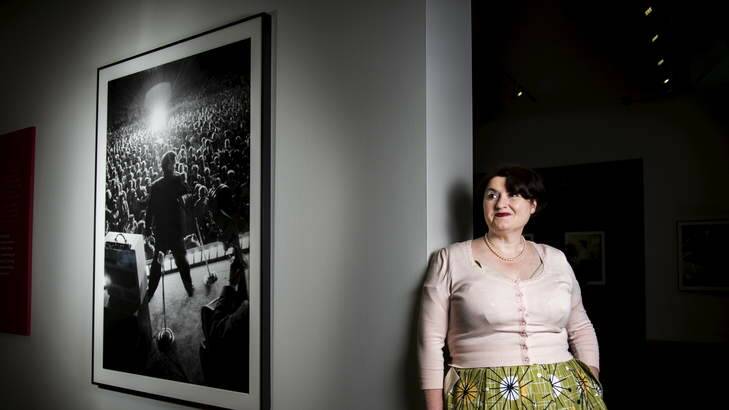 Associate registrar Maria Ramsden with photographs by Alfred Wertheimer at the National Portrait Gallery. Photo: Rohan Thomson