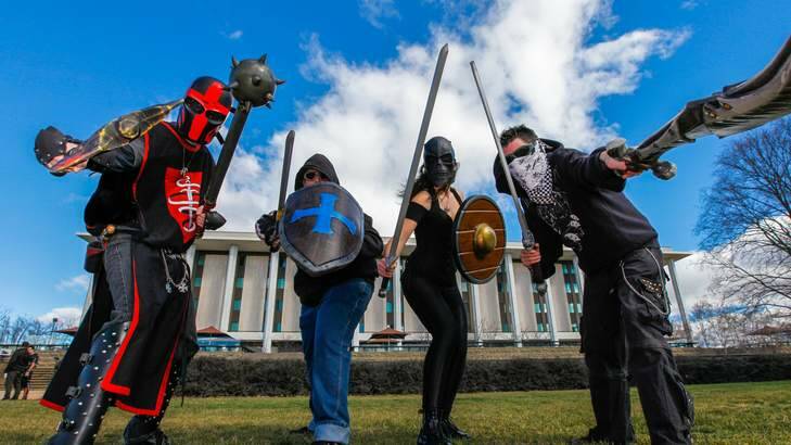 The Hundred Swords is a Canberra-based 'battle sports' group, left: Greg Holland of the 'Crimson Company', Jake Patten, Erica Moy known as 'Shield Maiden' and Ashley Charlton known as 'Death Reign'. Photo: Katheirne Griffiths