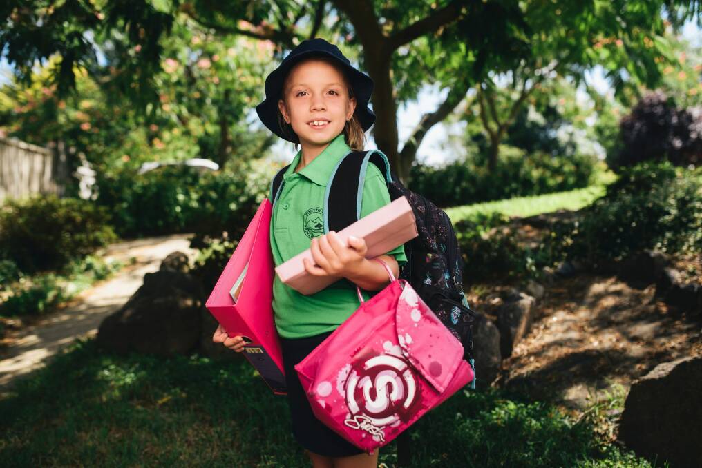 Bella Titulaer who is going into year 4 at Bonython Primary with her school bag, books, lunchbox and iPad ready for the year ahead. Photo: Rohan Thomson