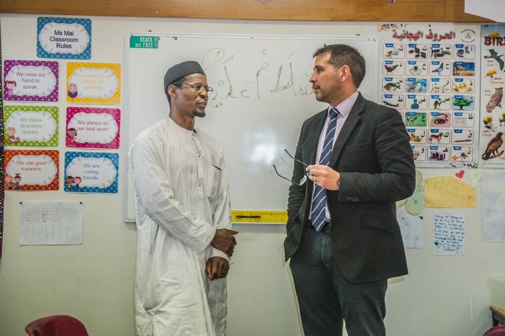 The Islamic School of Canberra is making a plea to the federal government regarding the loss of their funding. Teacher Adama Konda, left, and Principal David Johns Photo: Karleen Minney