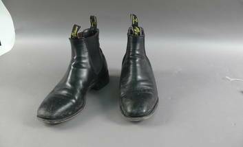 Former prime minister Kevin Rudd's boots are on display at the Museum of Australian Democracy.