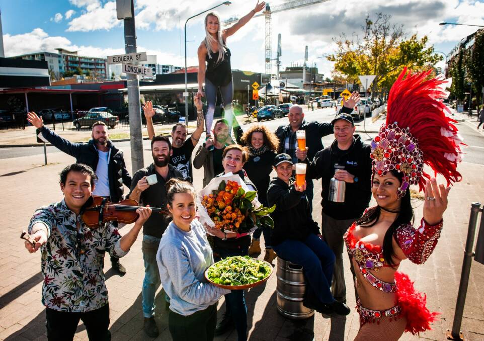 Braddon business owners and performers get into the party mode on Lonsdale Street. Photo: Elesa Kurtz