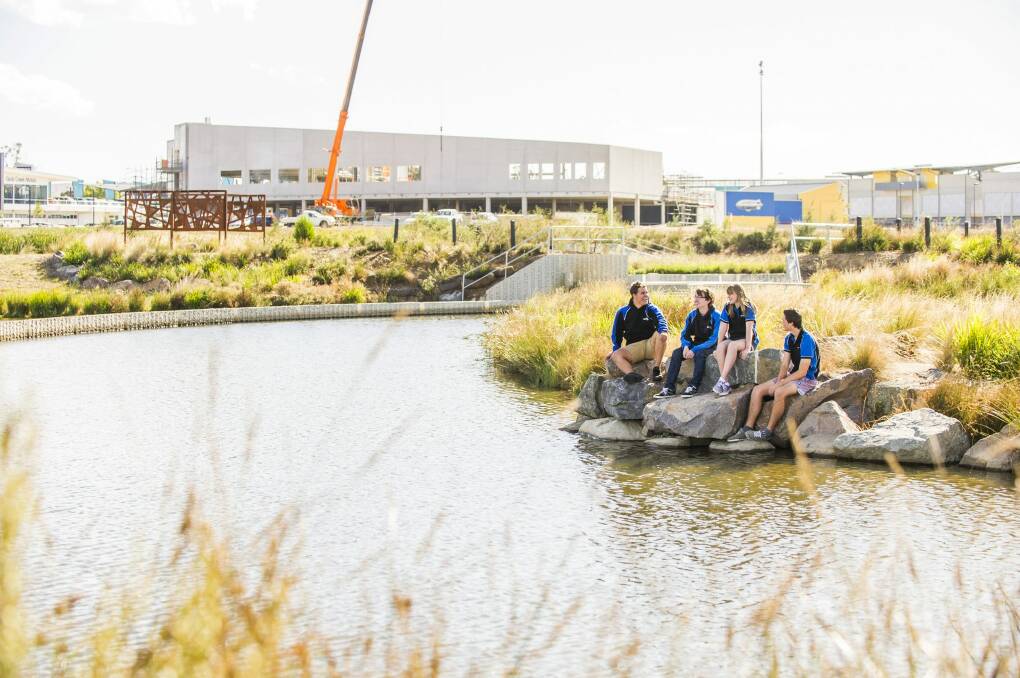 Gungahlin College year 12 students, Sam Thurkettle, Christopher Edwards, Isabelle Francis, and Shannon Grant at the official launch of the Gungahlin Valley ponds. Photo: Rohan Thomson