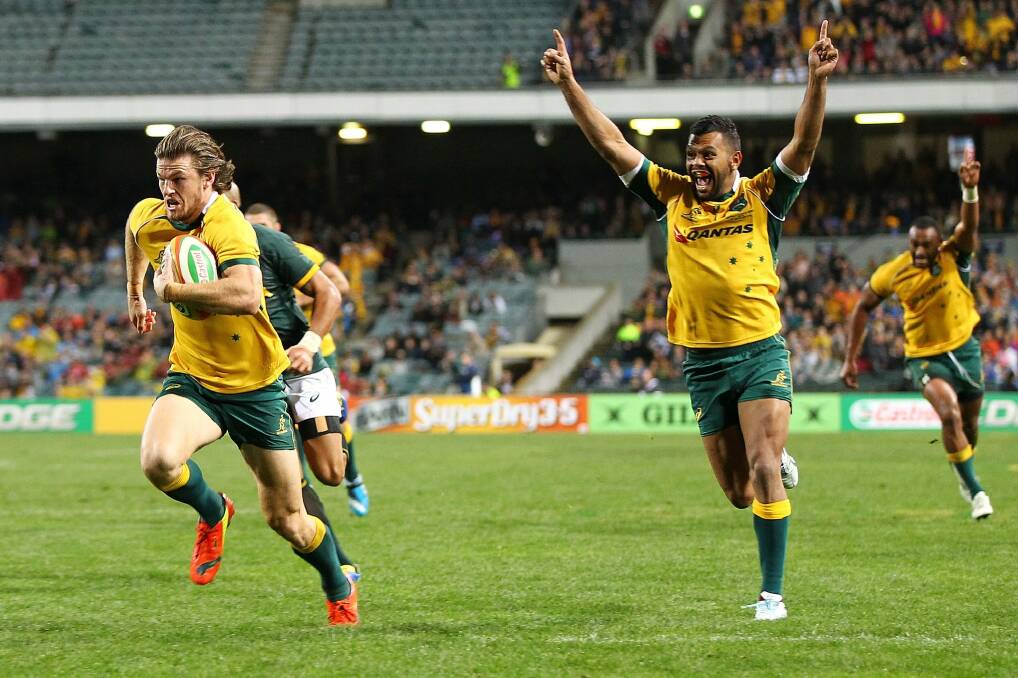 Rob Horne scoring the match-winning try for the Wallabies over South Africa. Photo: Getty Images