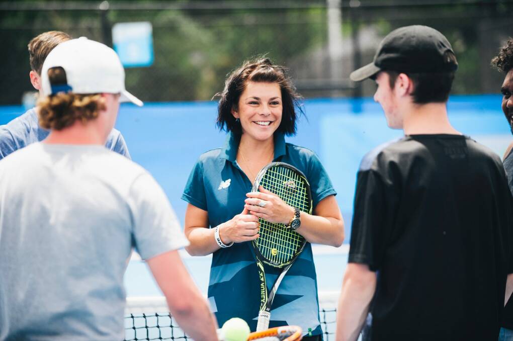 Tennis coach Airlie Chalmers working with disadvantaged young people at Tennis ACT as part of a program organised by Tennis ACT, the Ted Noffs Foundation, and Manteena. Photo: Rohan Thomson