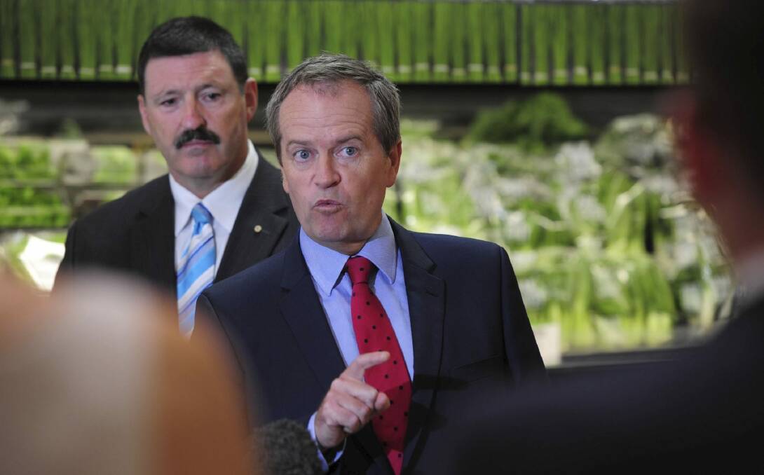 Labor leader Bill Shorten with the party's Eden-Monaro candidate Mike Kelly in Queanbeyan. Photo: Graham Tidy