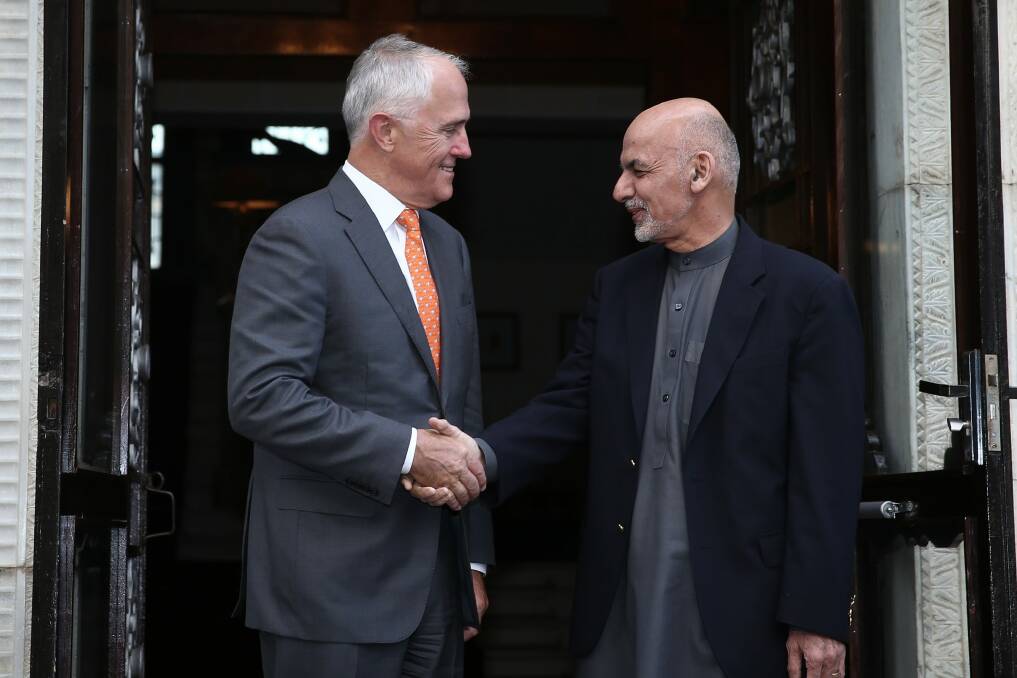 Mr Turnbull and Dr Ghani during a ceremonial welcome at the Presidential Palace in Kabul. Photo: Alex Ellinghausen