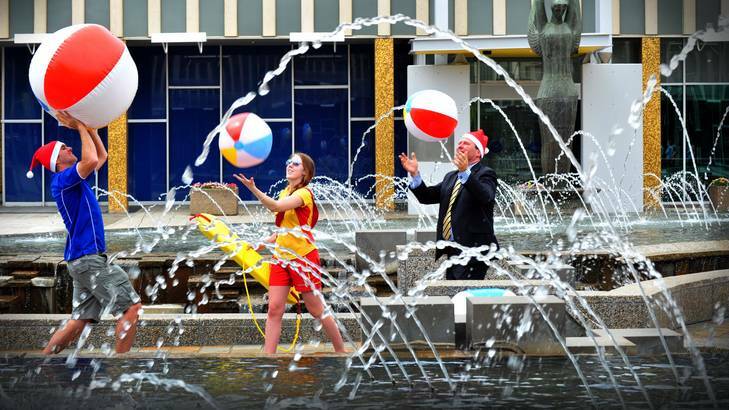 From left, Sean Hodges, Dana Simonsen and Stephen Gregory promote Canberra's 12-day Christmas Carnival. Photo: Karleen Minney