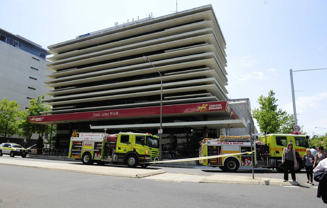ACT Fire and Rescue at the Uni Pub investigating smoke from an exhaust duct.  Photo: Melissa Adams