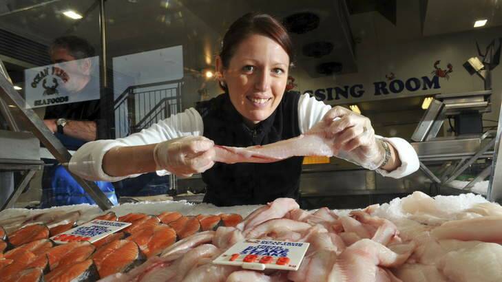 Co owner of Ocean Fresh Seafoods, Fyshwick Market, Jenny Jones, holding flake steaks. Photo: Graham Tidy