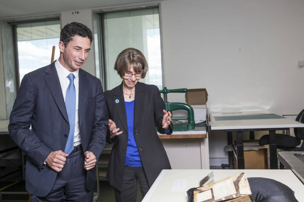 National Library Chairman Ryan Stokes and director-general Anne-Marie Schwirtlich with items from the National Library's collection that will be displayed with the Rothschild Prayerbook.  Photo: Matt Bedford