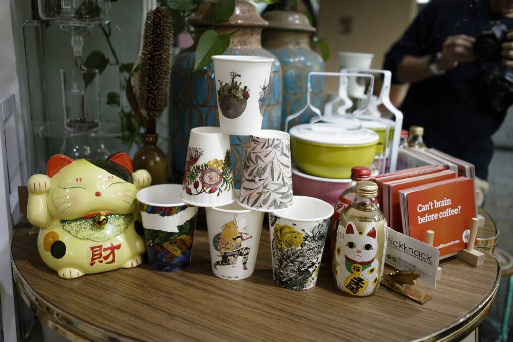 Some of the colourful coffee takeaway BioCups at Little Oink cafe in Cook. Photo: Hugo Sharp